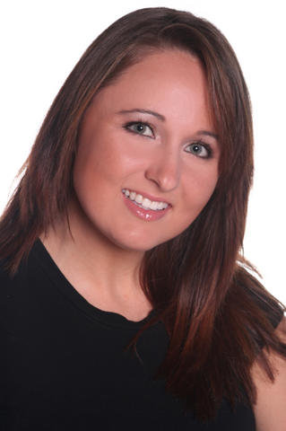 Headshot of Brittney smiling. 